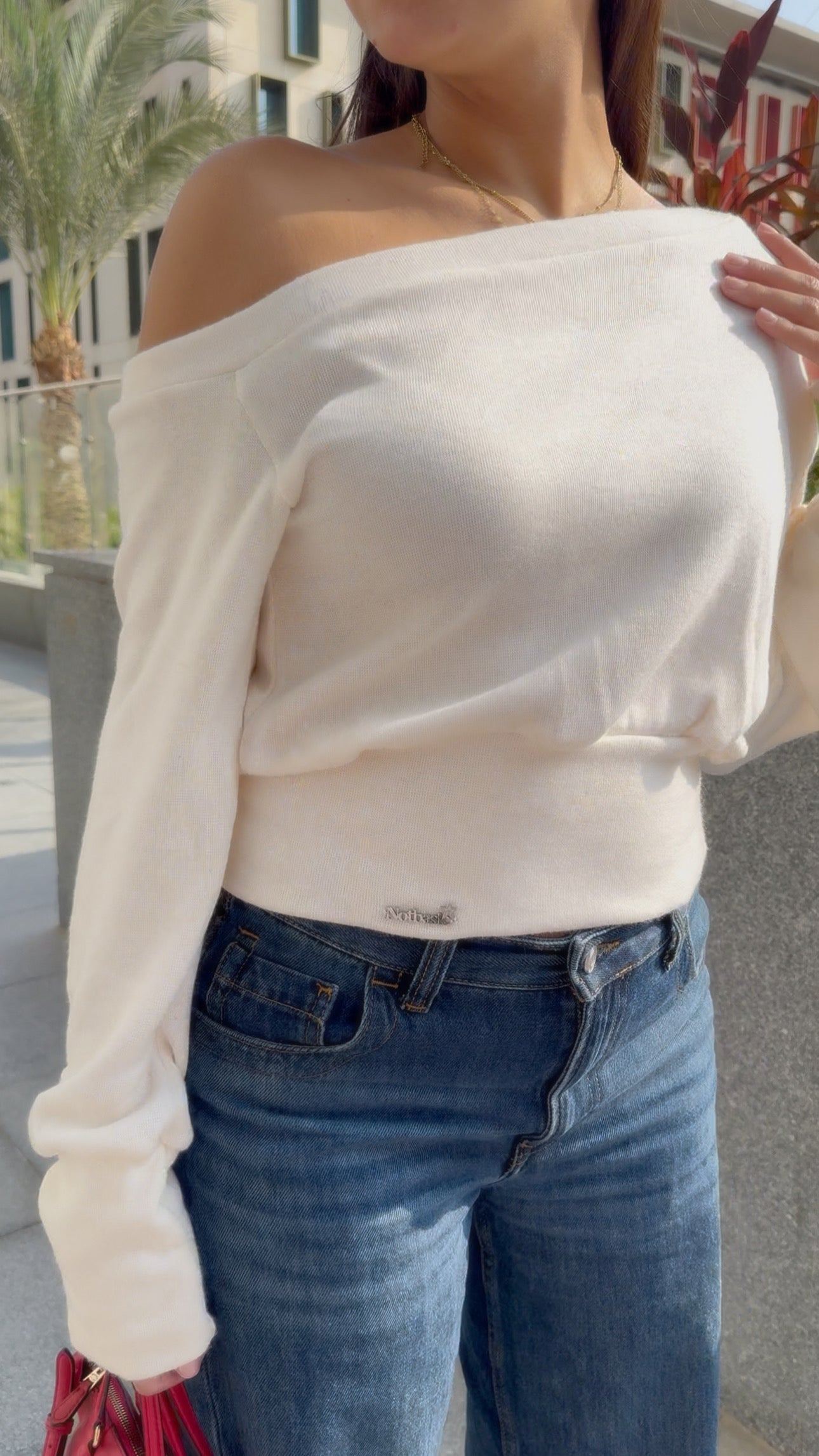 One-shoulder corset knit sweater
