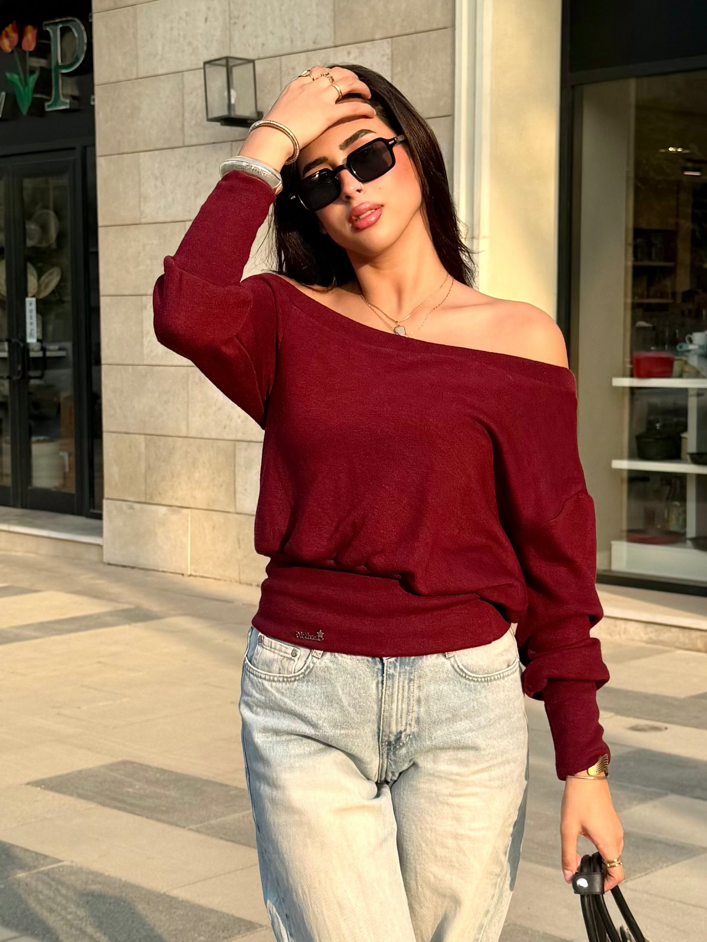 One-shoulder corset knit sweater