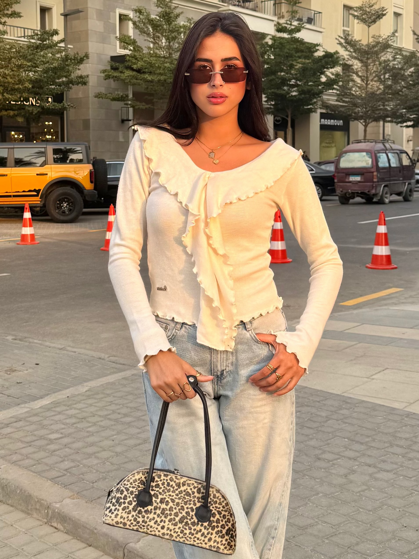 Off-shoulder Ruffled knit top