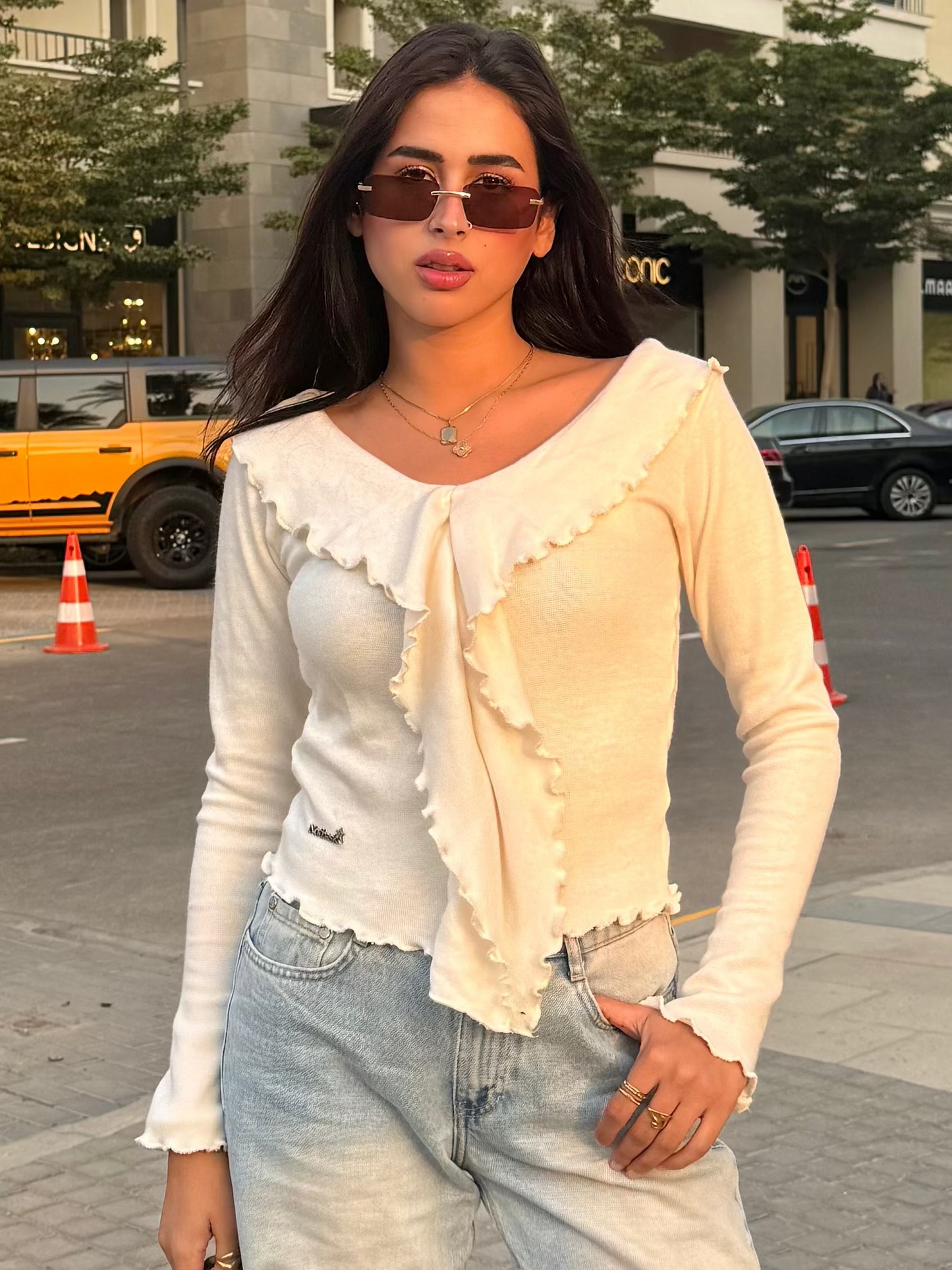 Off-shoulder Ruffled knit top