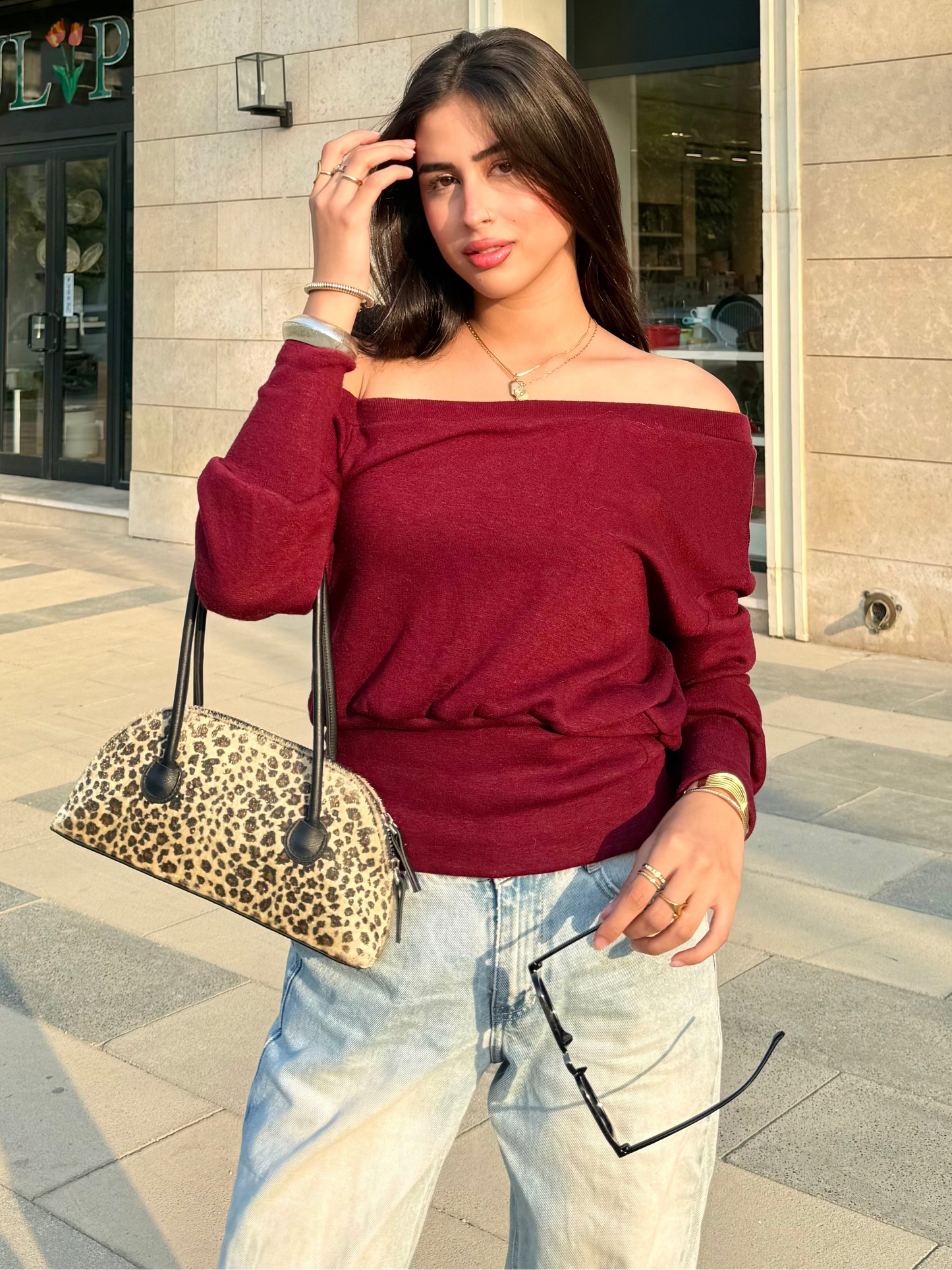 One-shoulder corset knit sweater