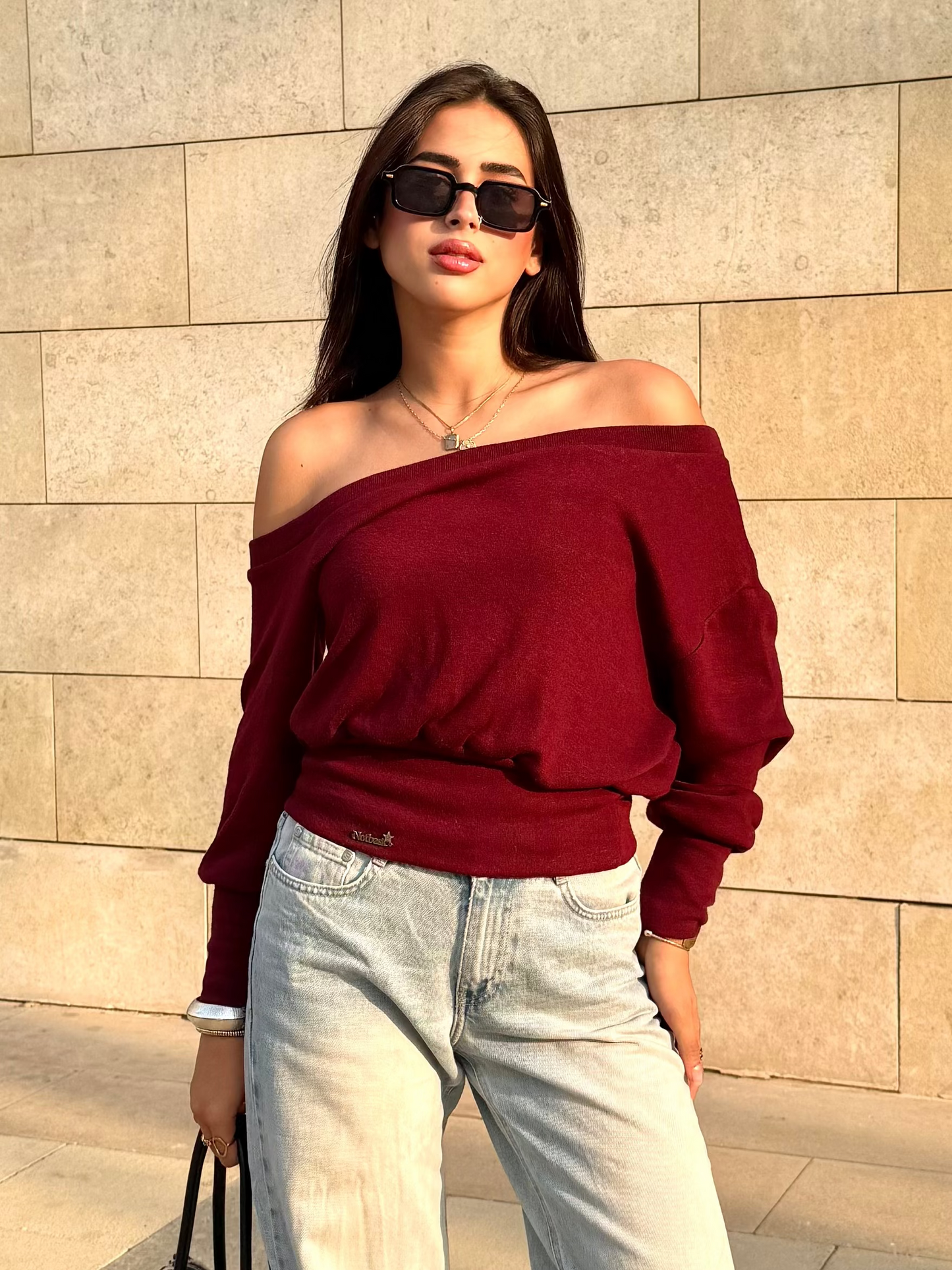 One-shoulder corset knit sweater