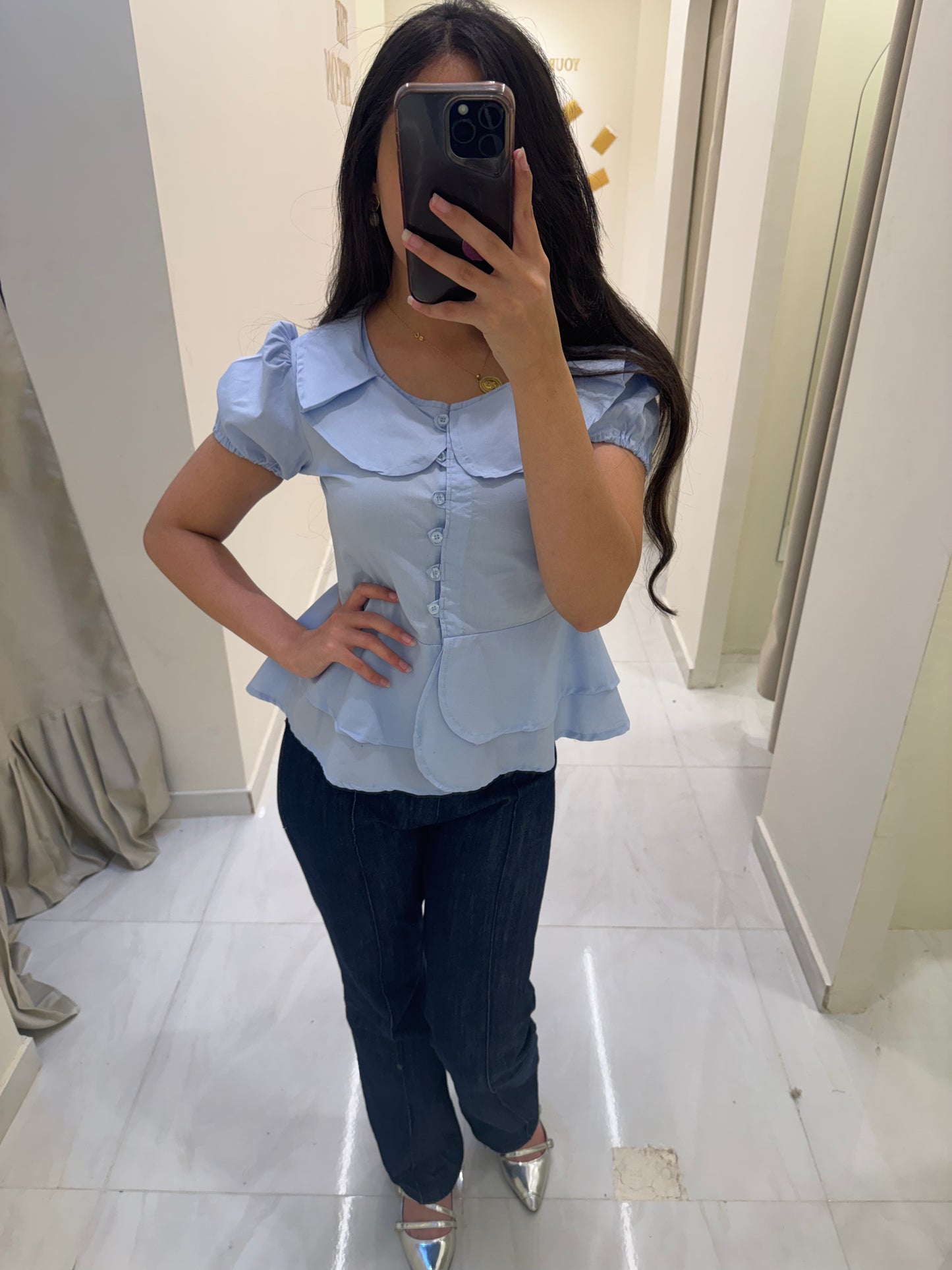 layered baby blue blouse